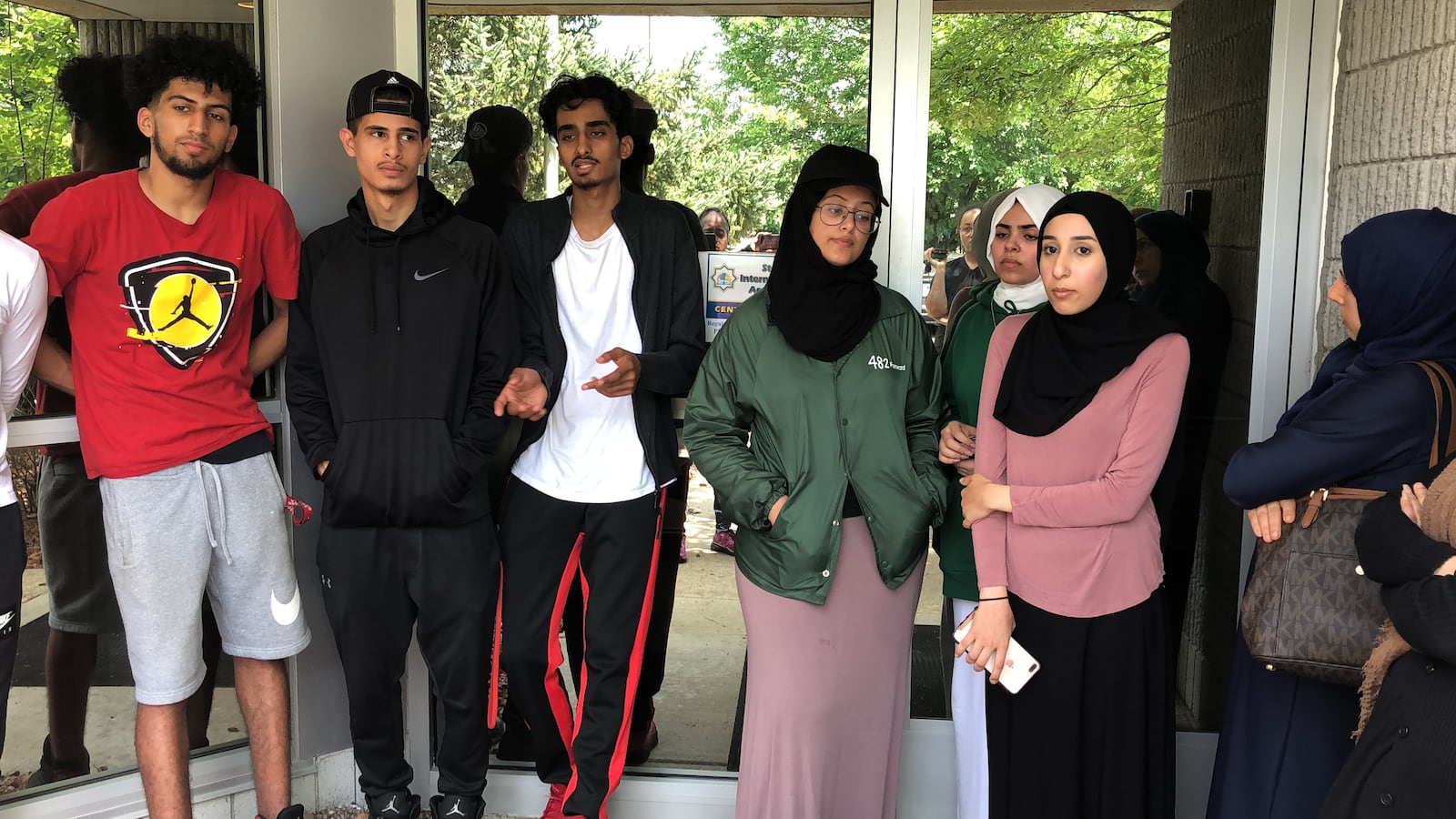 Students hoping to obtain their transcripts waited outside their Detroit charter school, Universal Academy, for more than an hour. Office workers inside would not unlock the door.