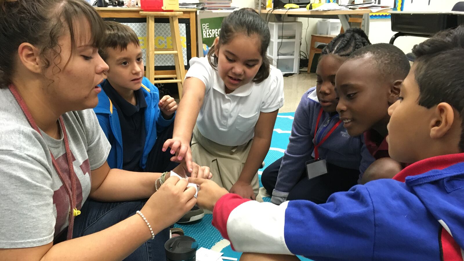 Third-grade students work in a small group with a student teacher to practice multiplication at Indianapolis Public Schools' Lew Wallace School 107 on Oct. 3, 2018.