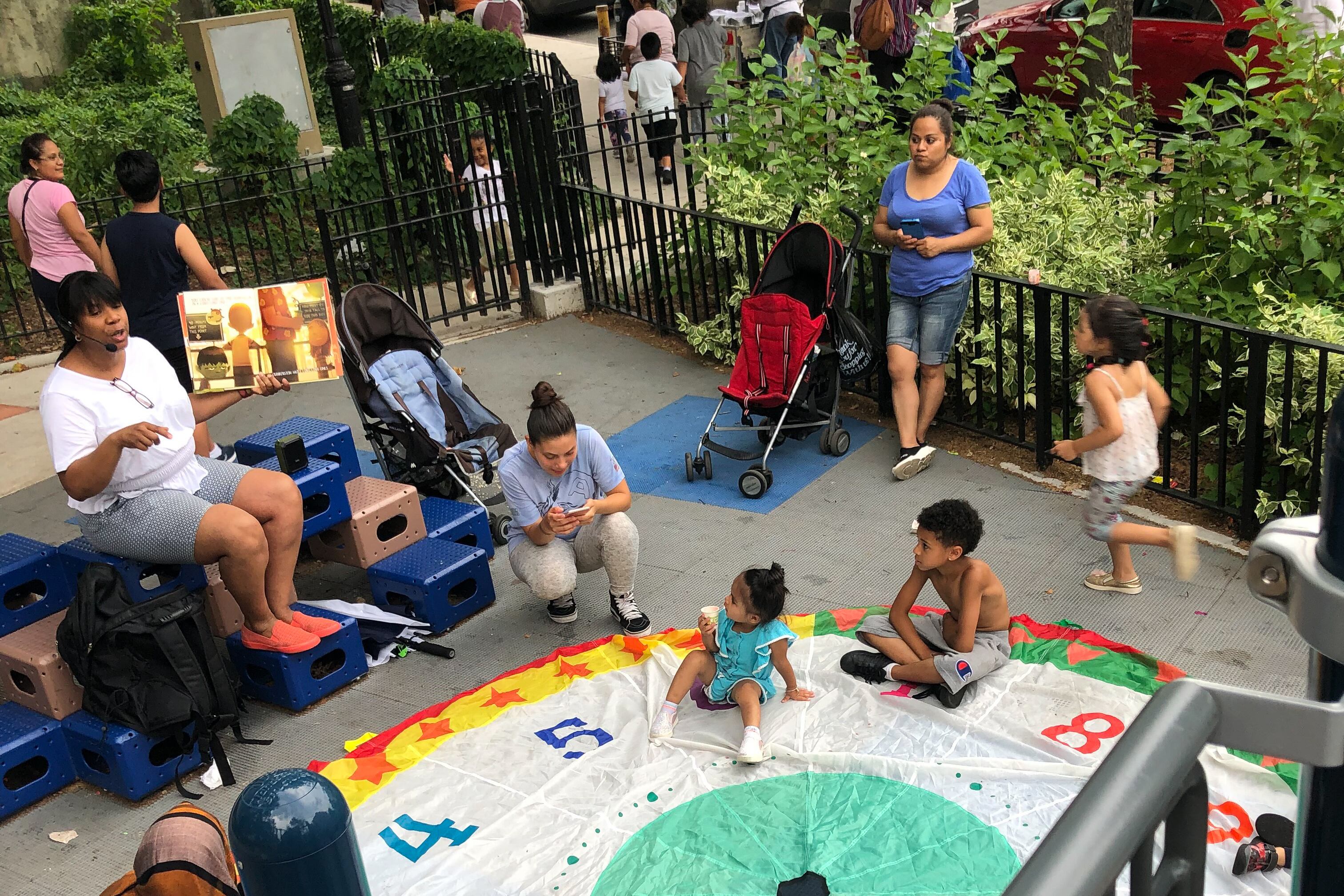 Most Saturdays, Danielle Guggenheim will sit outside and read books aloud to any children that want to stop and listen at her neighborhood farmers market in the Bronx. Guggenheim has taught virtually this year as an elementary special education teacher at P.S. 200, The James McCune Smith School, in Harlem.