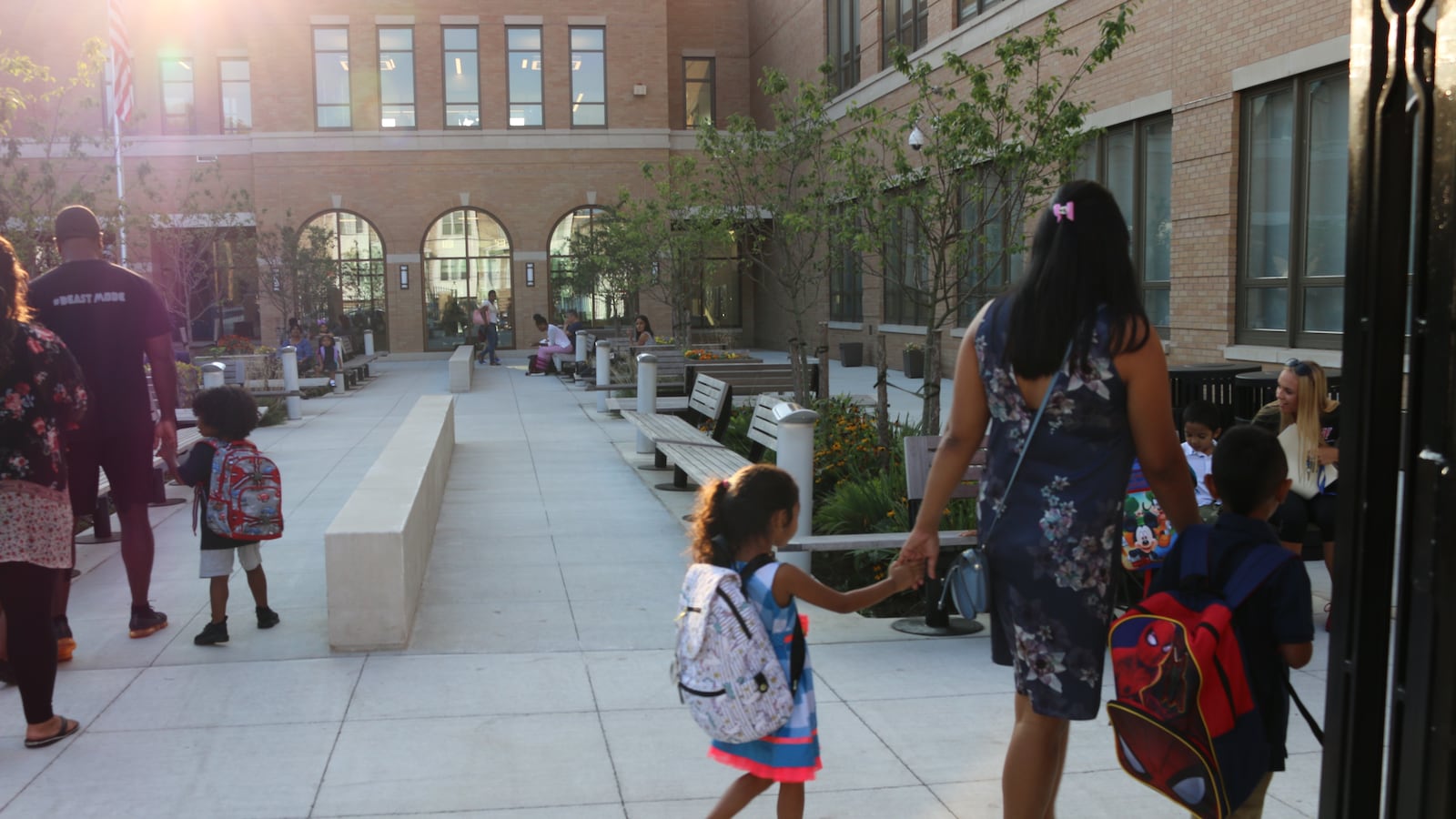 Parents drop students off to school on the first day of the 2018-2019 school year.
