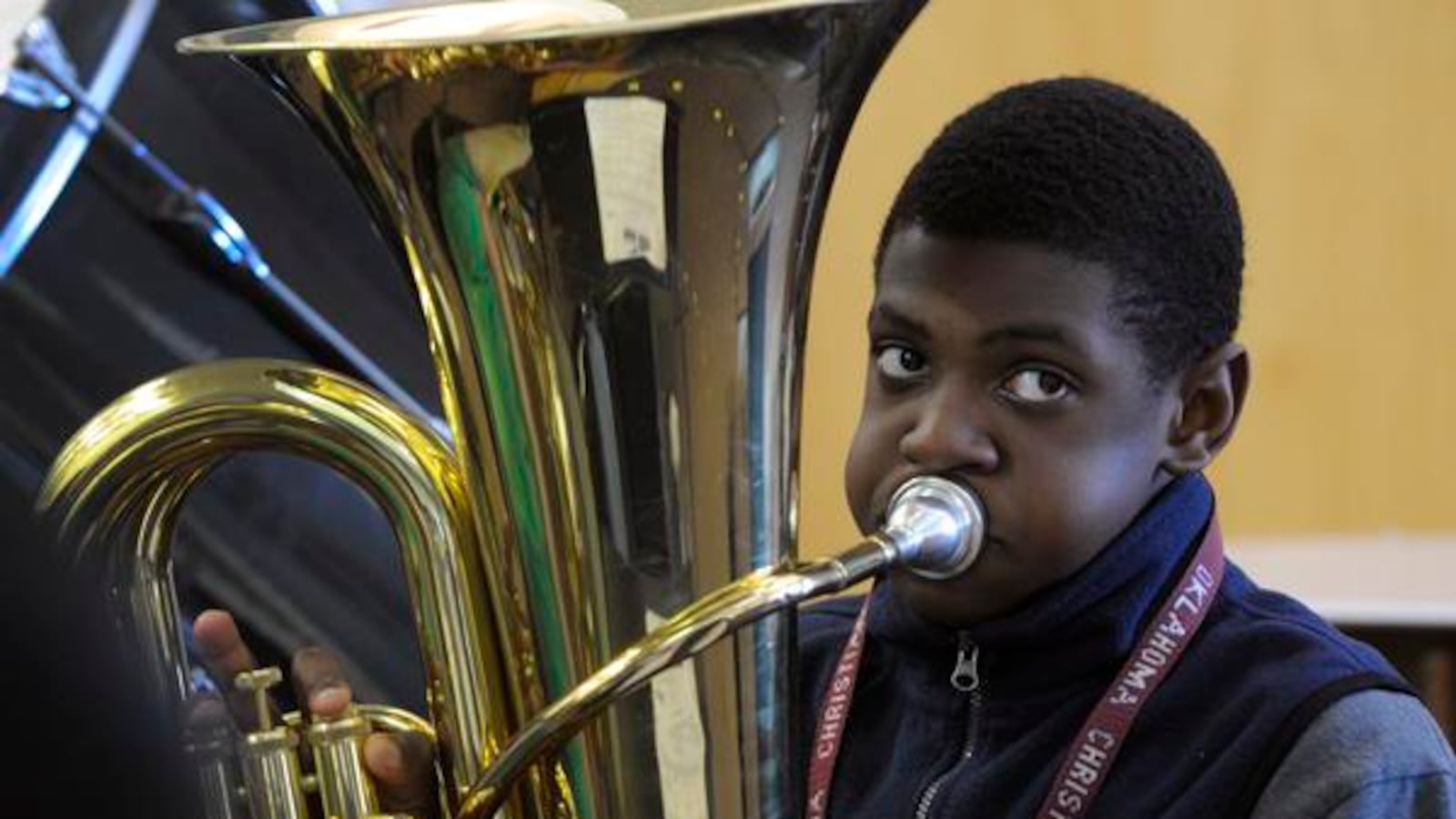 Adrian Jackson, 12, practices his tuba with members of the 6th-grade concert band at Noel Community Arts School in 2012.