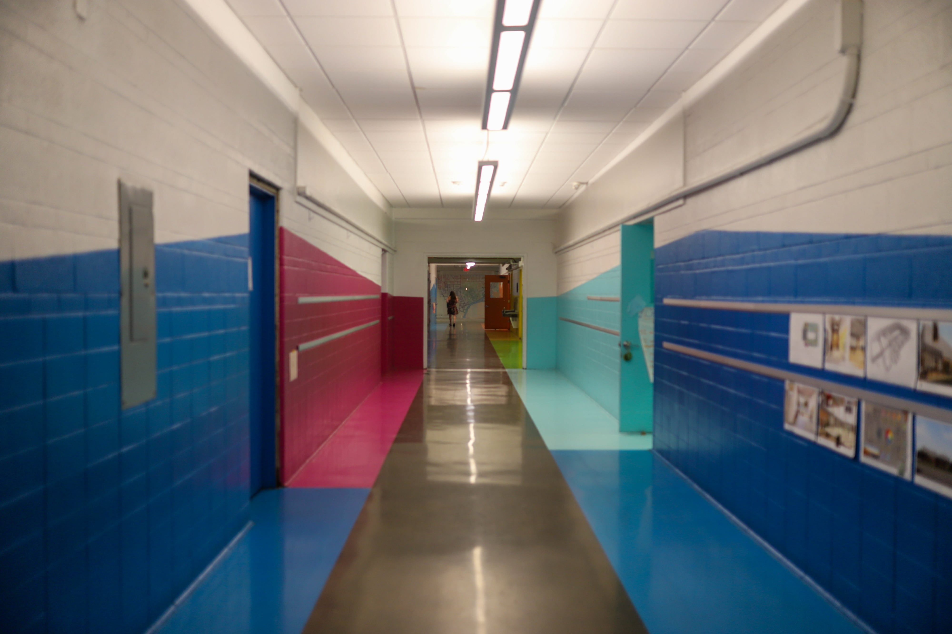 An empty school hallway.