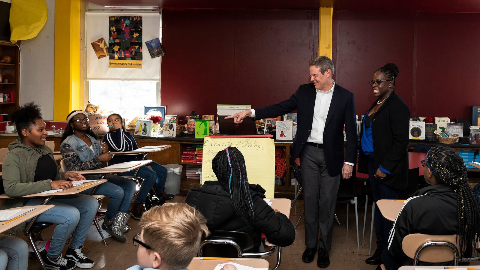 Gov. Bill Lee visits with students at McKissack Middle School in Nashville, one of five cities that would be affected by his proposal to bring a new type of education voucher program to Tennessee.