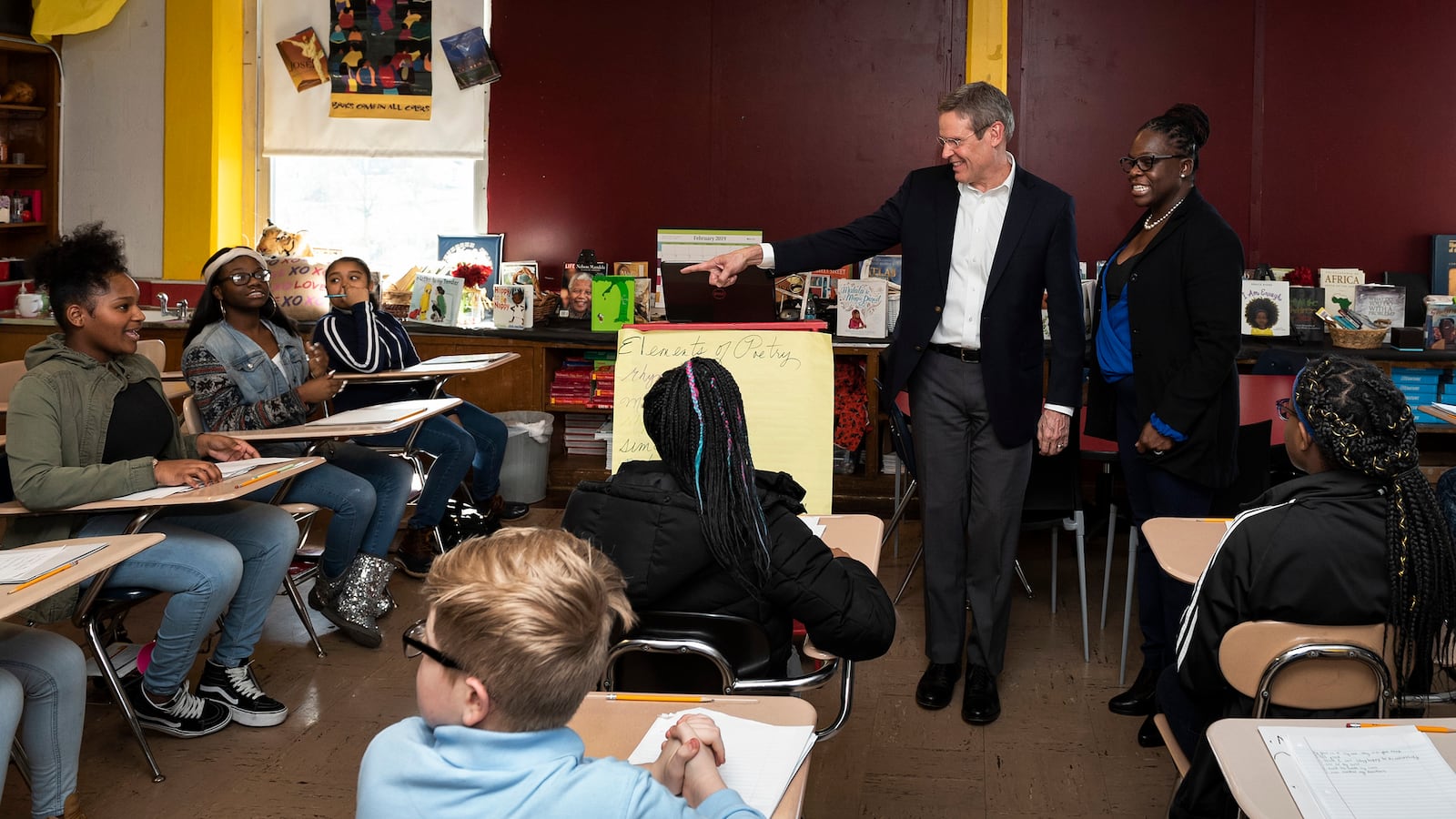 Gov. Bill Lee visits with students at McKissack Middle School in Nashville, one of five cities that would be affected by his proposal to bring a new type of education voucher program to Tennessee.