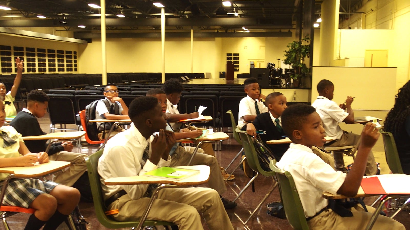 Memphis Business Academy is using makeshift classrooms in the auditorium to keep up with student enrollment, which is at about 1,000 students at the charter school's Frayser campus.