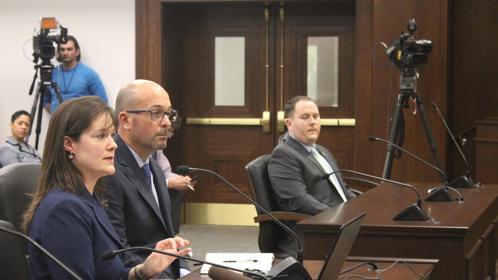 Tennessee Education Commissioner Candice McQueen testifies before state lawmakers about technical problems that stalled students' online TNReady tests in April of 2018, while Questar executive Brad Baumgartner listens.