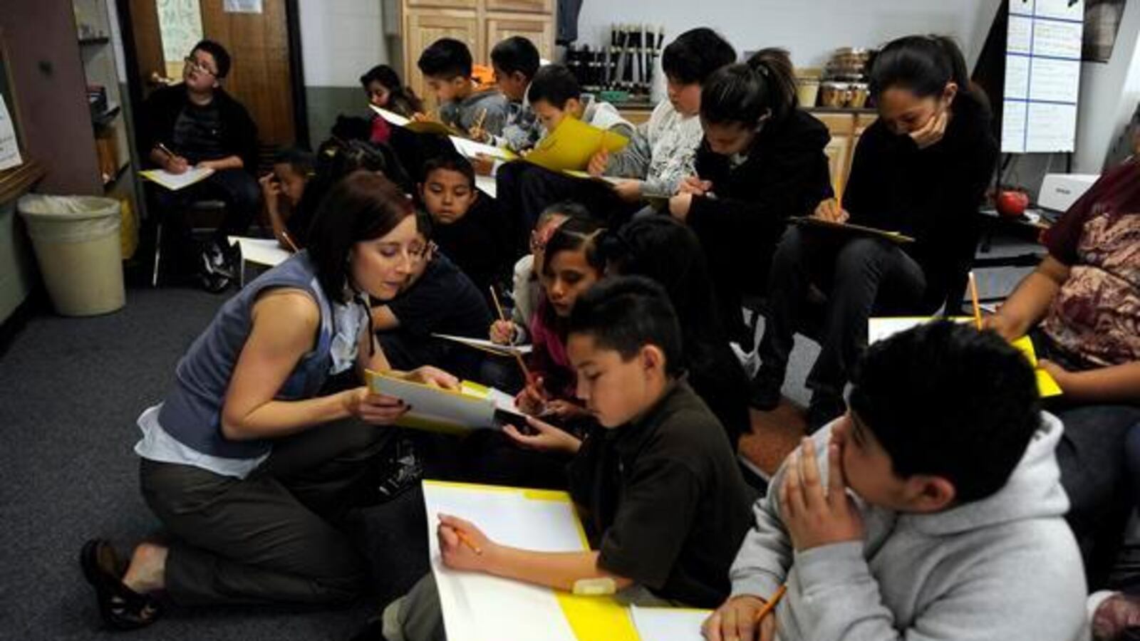 Music teacher, Kristin Lewis, works with her 5th grade students in 2011 at Monaco Elementary School  in the Adams 14 district.