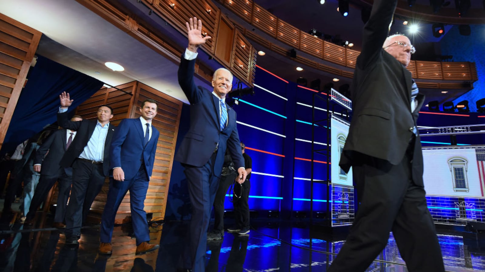Democratic presidential candidates Andrew Yang, South Bend Mayor Pete Buttigieg, former U.S. vice president Joe Biden, and Sen. Bernie Sanders take the stage for the first Democratic presidential primary debate for the 2020 election.