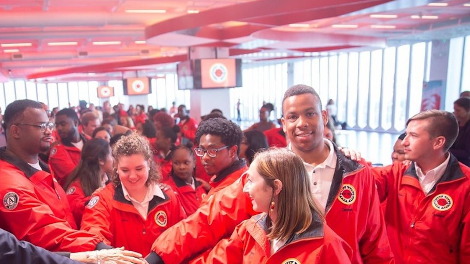 City Year Americorp members close their  graduation ceremony with a spirited celebration.