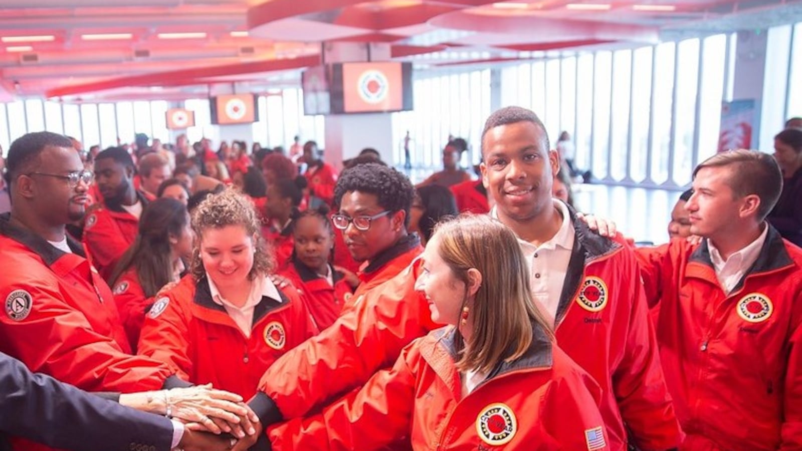 City Year Americorp members close their  graduation ceremony with a spirited celebration.