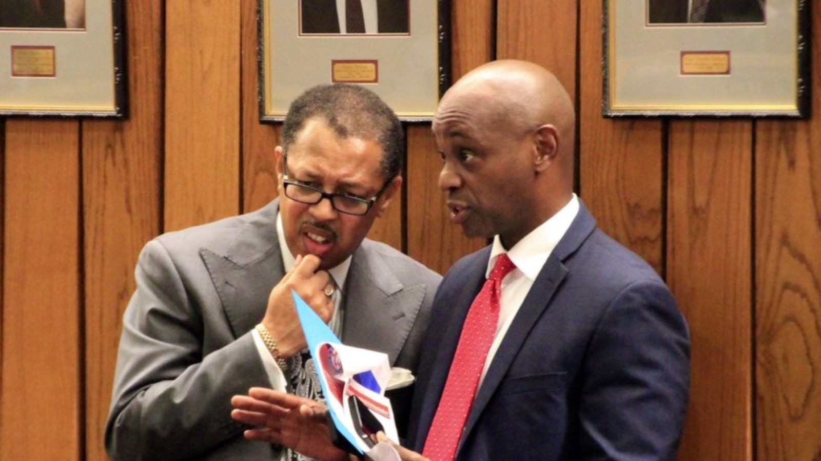 From left: Shelby County Commissioner Willie Brooks and Schools Superintendent Dorsey Hopson confer about education funding in the county’s budget in June 2016.
