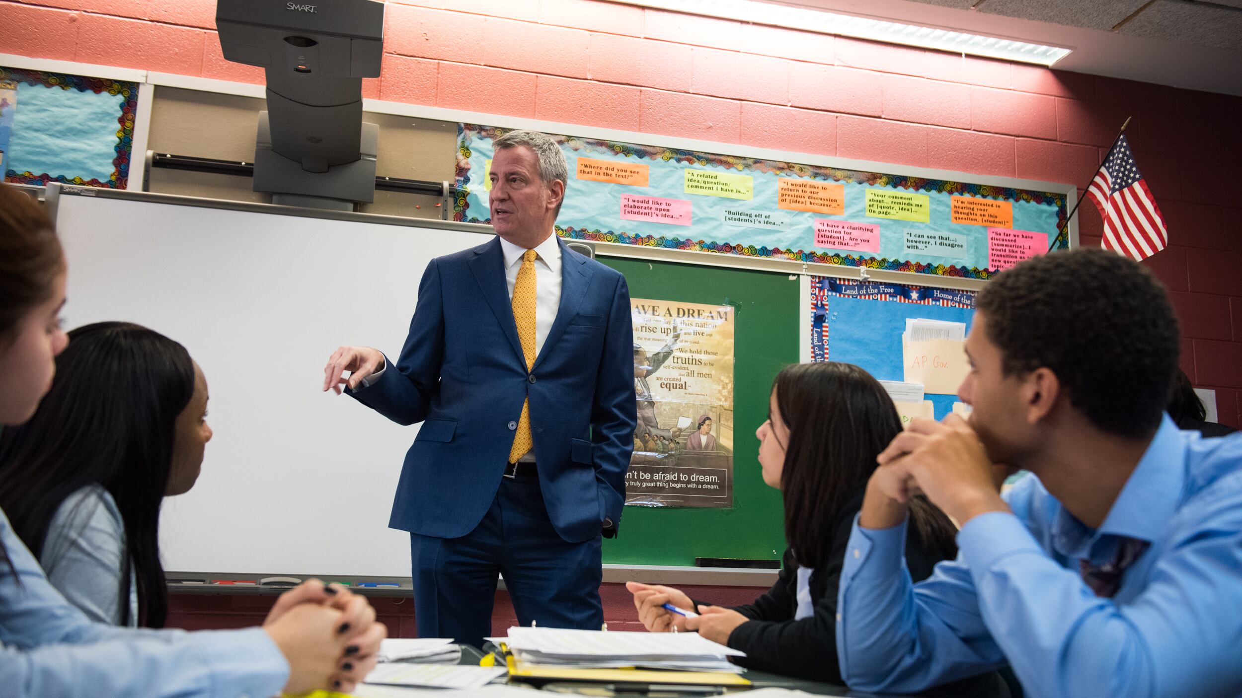 New York City Mayor Bill de Blasio, pictured here at a Bronx school in 2017, is facing increasing pressure to close schools.
