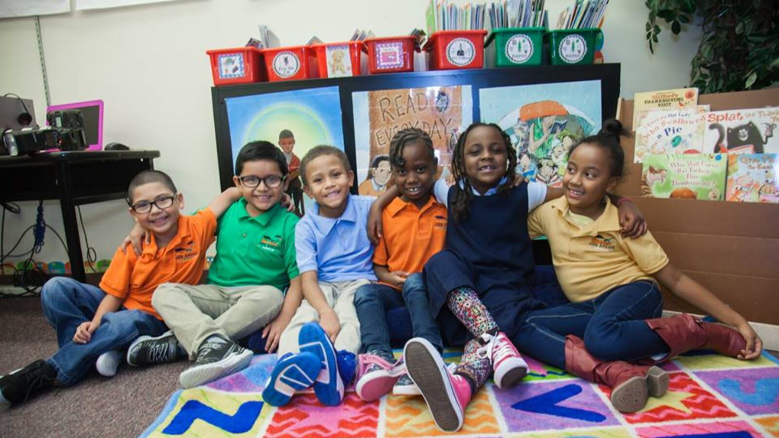 Students at John Amesse Elementary smile for the camera. The school is being "restarted" this year and is now known as John H. Amesse Elementary.