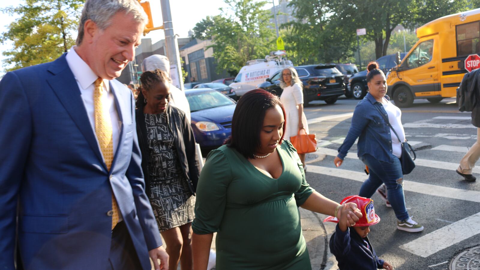 Mayor Bill de Blasio walks to P.S. 277 in the Bronx with three-year-old Joel Lopez and his mother, Astrea Ramirez, on the first day of school last year.