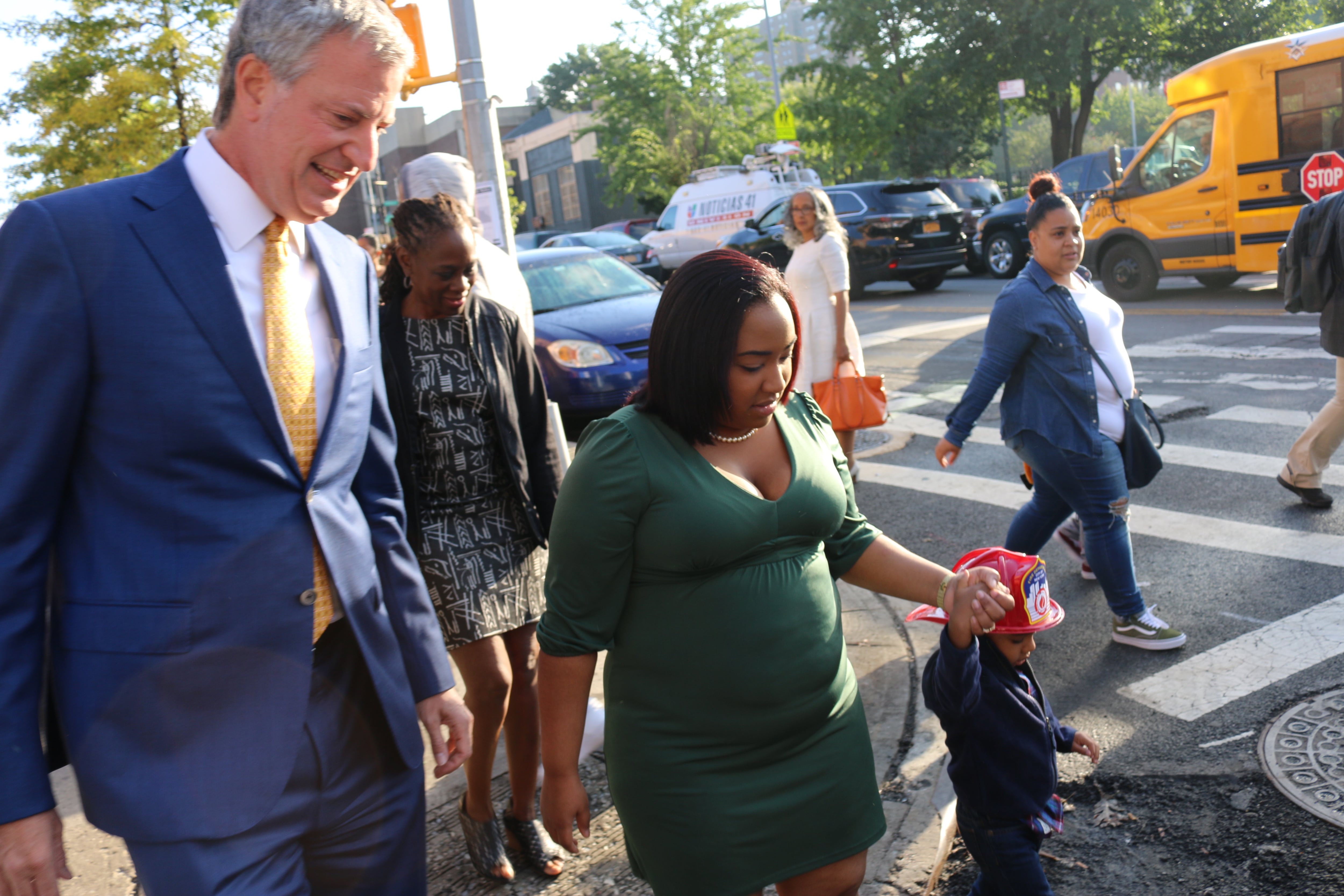 Mayor Bill de Blasio walks to P.S. 277 in the Bronx with three-year-old Joel Lopez and his mother, Astrea Ramirez, on the first day of school last year.