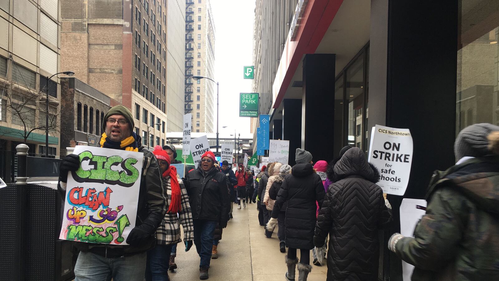 Teachers and supporters march in front of Chicago International Charter Schools’ corporate offices on the fifth day of the strike.