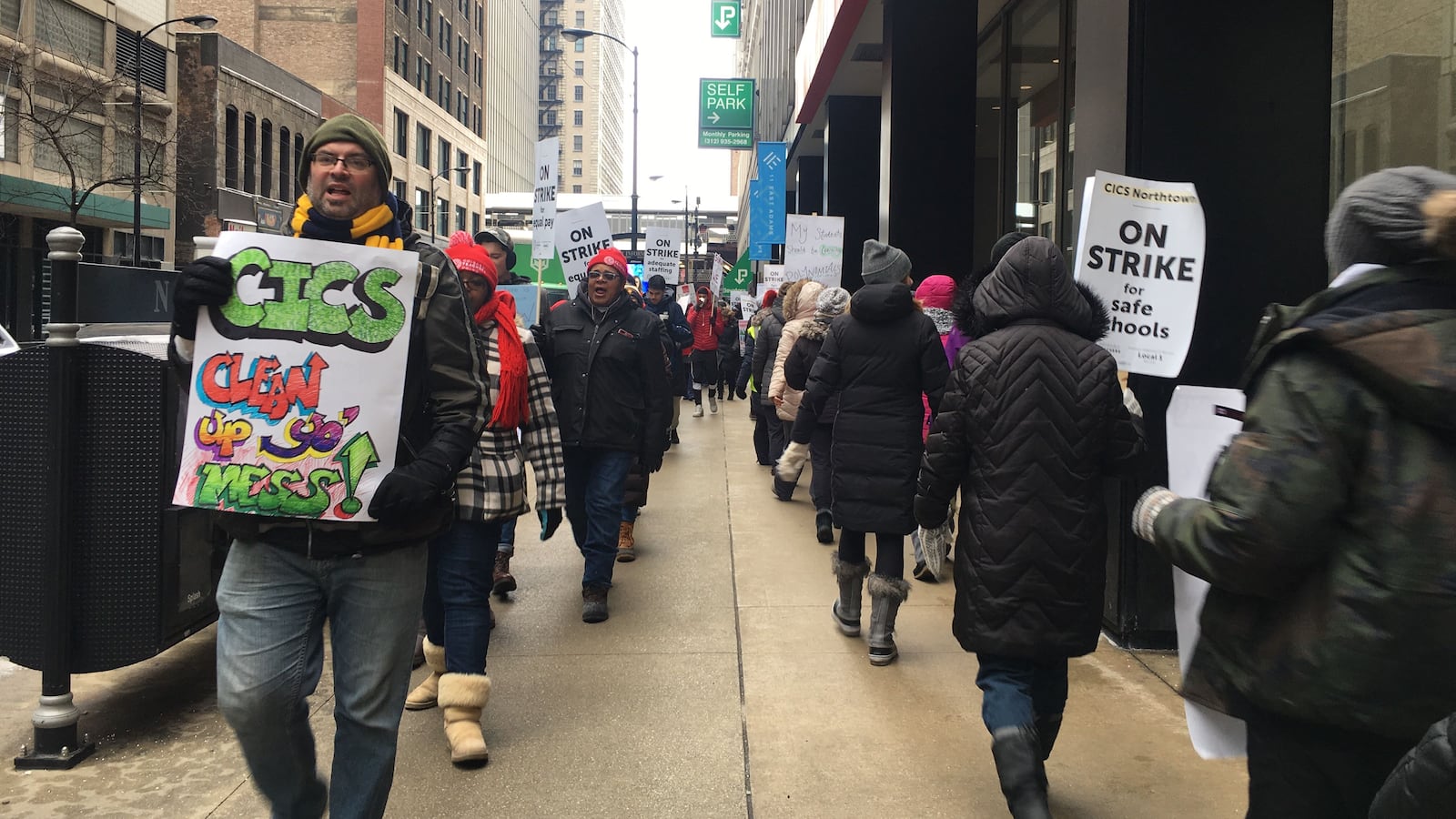 Teachers and supporters march in front of Chicago International Charter Schools’ corporate offices on the fifth day of the strike.