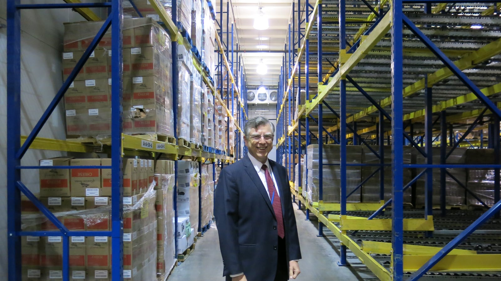 Frank Cook, Shelby County Schools' interim nutrition services director, poses for a picture inside the freezer at the central nutrition center in Memphis. The district plans to expand the freezer by 12,000 square feet in the next year.