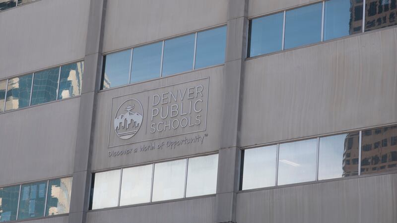 The front of Denver Public Schools offices, a gray building with windows