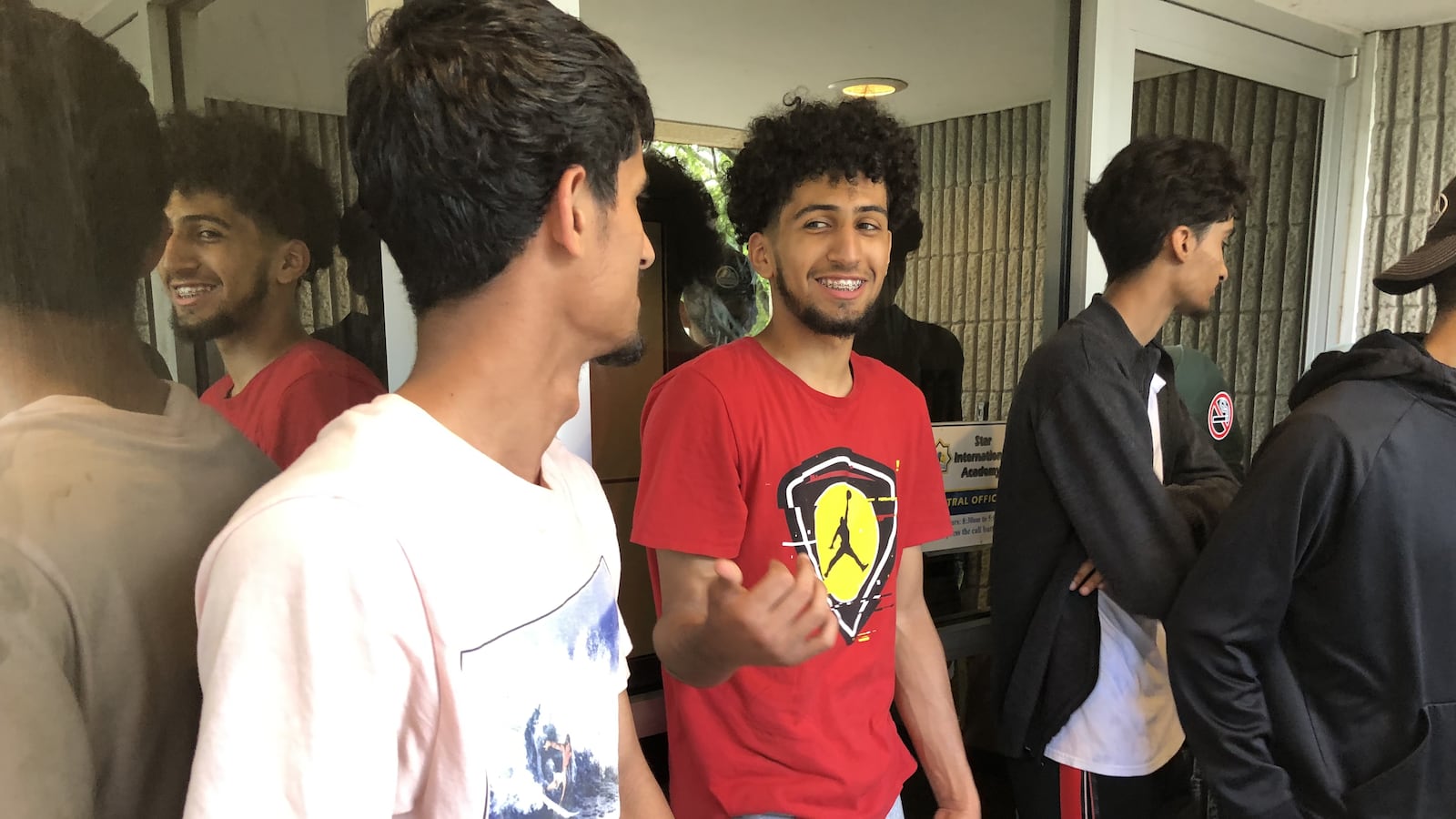 Students hoping to obtain their transcripts waited outside their Detroit charter school, Universal Academy, for more than an hour in early July. Office workers inside would not unlock the door.