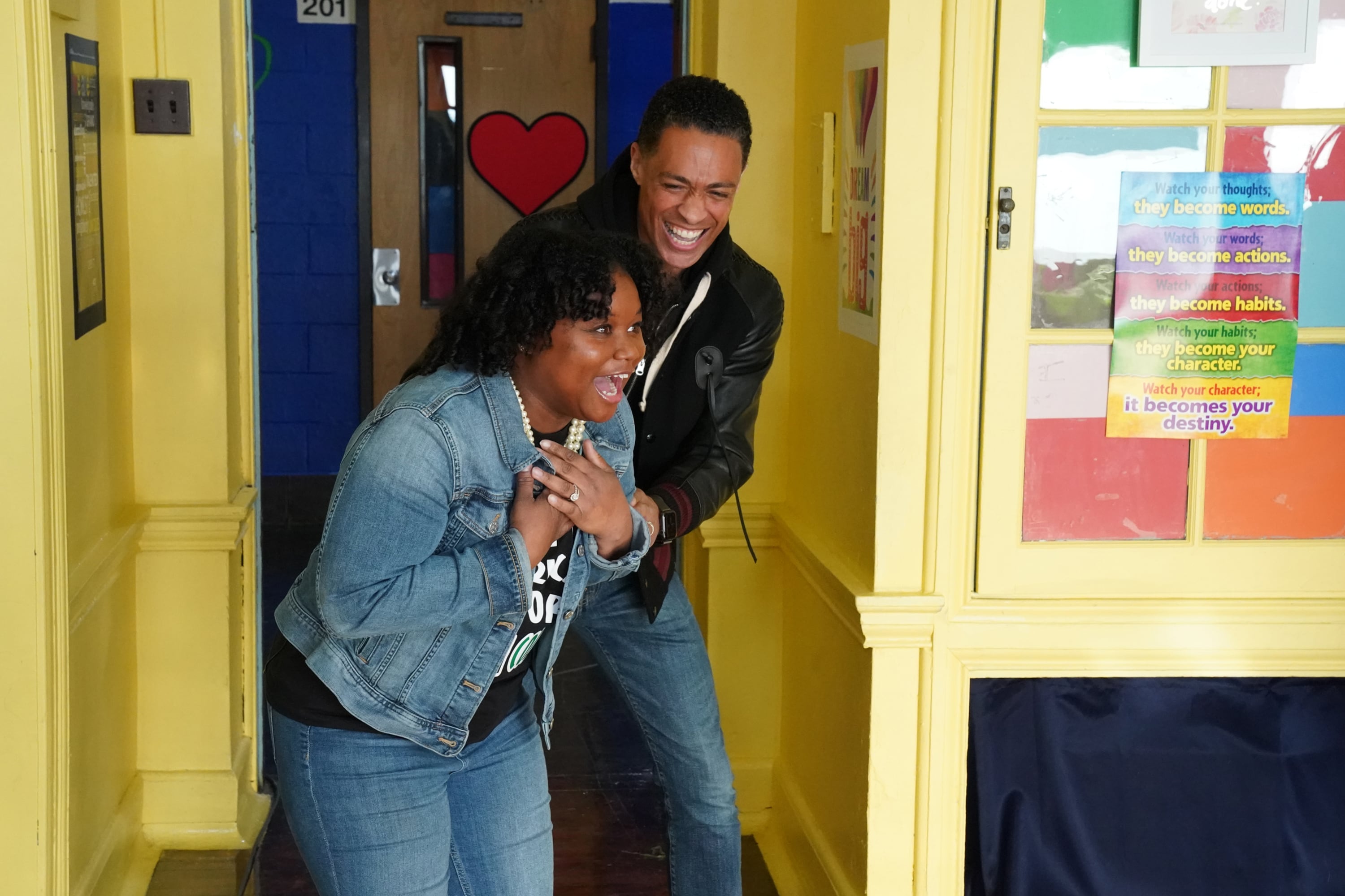Teacher gasps for air as she is surprised for her work inspiring students at Comegys School in Southwest Philadelphia.