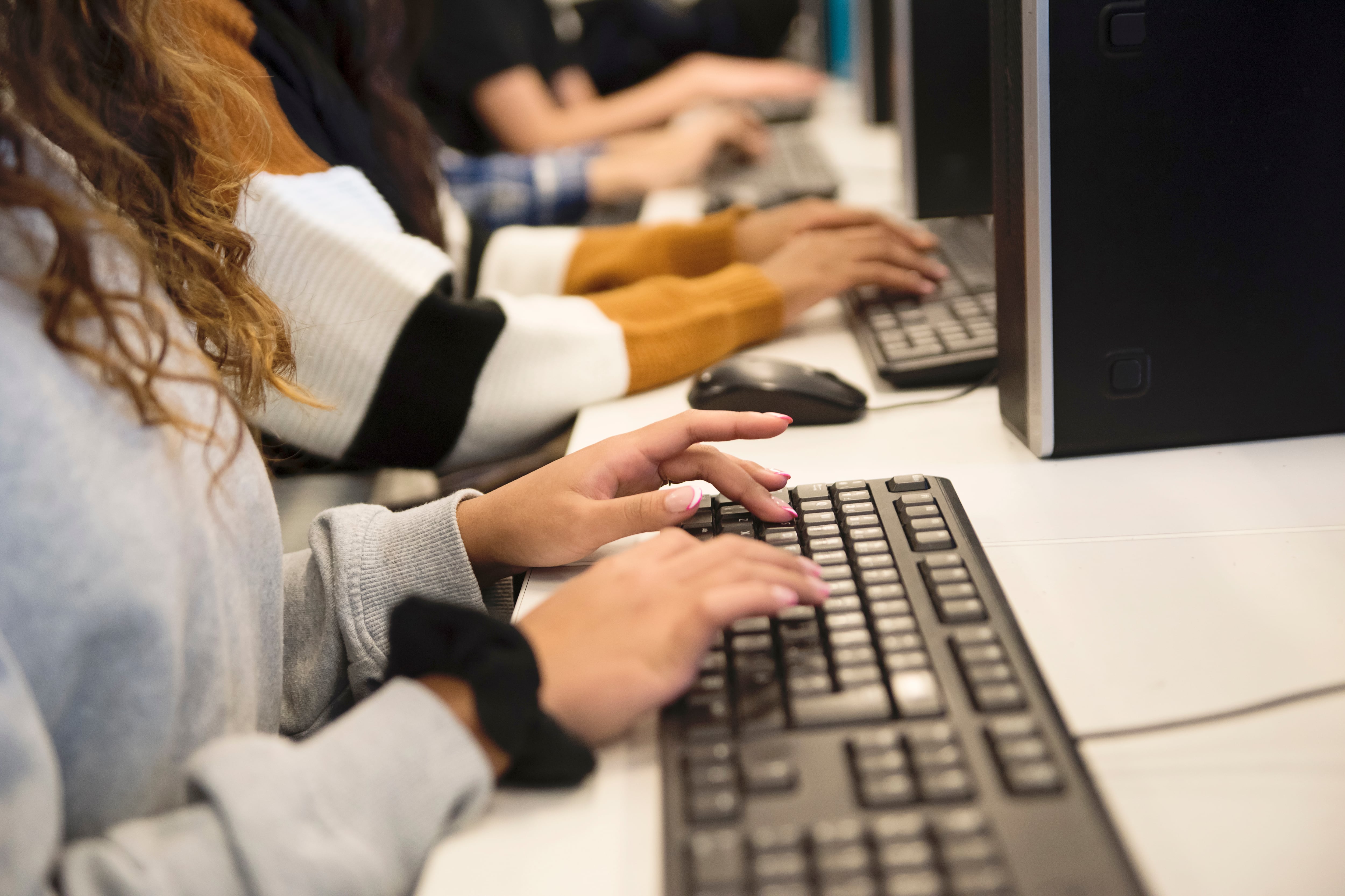 hands on computer keyboards