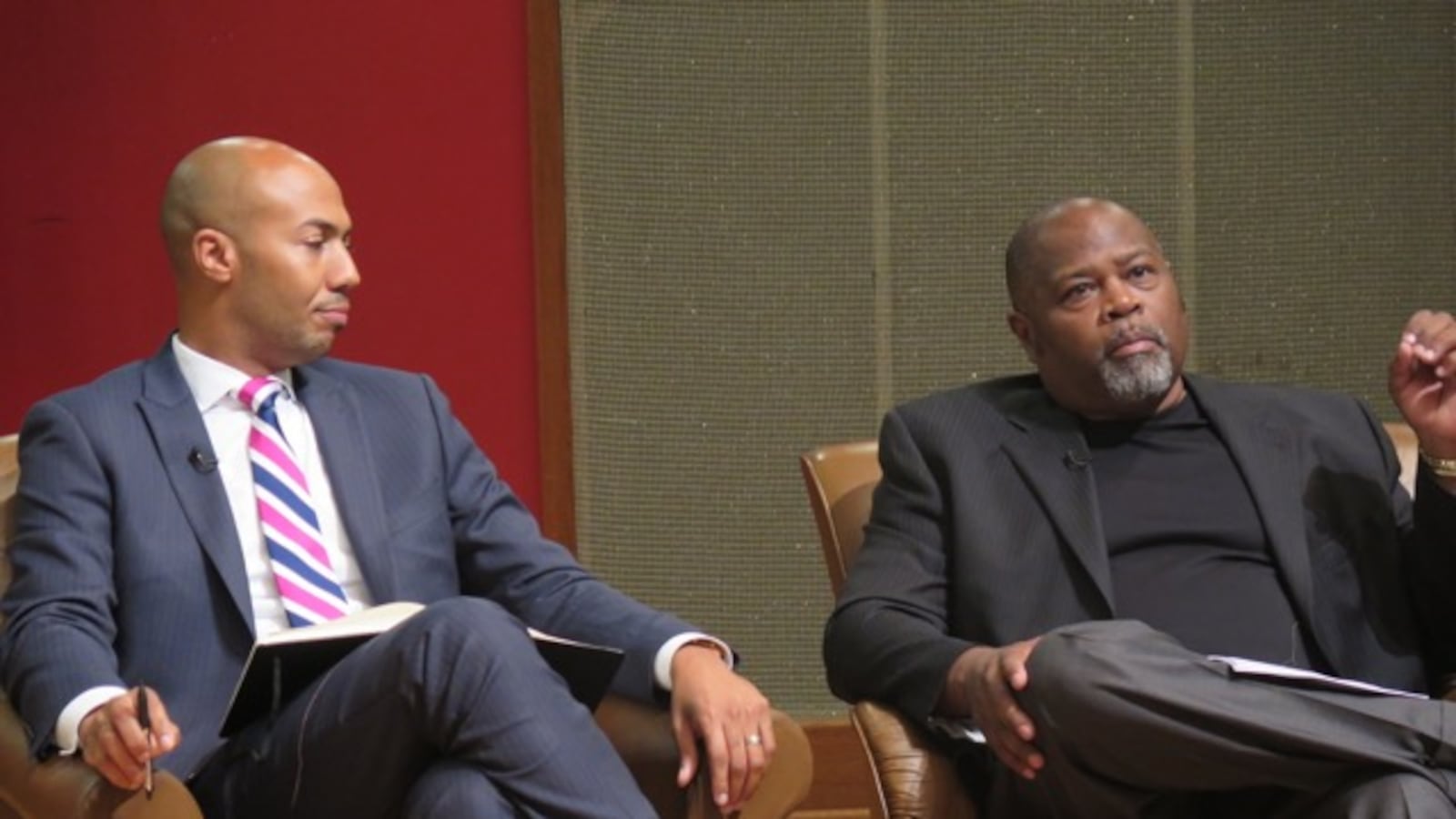 Ahmed Young (left), education director for the city of Indianapolis and Indiana University law professor Kevin Brown were among five panelists who discussed school integration in Indianapolis at an event co-sponsored by Chalkbeat.