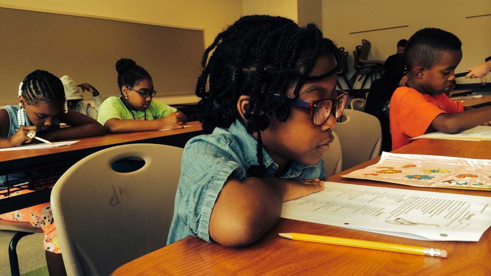 Students with worksheets.