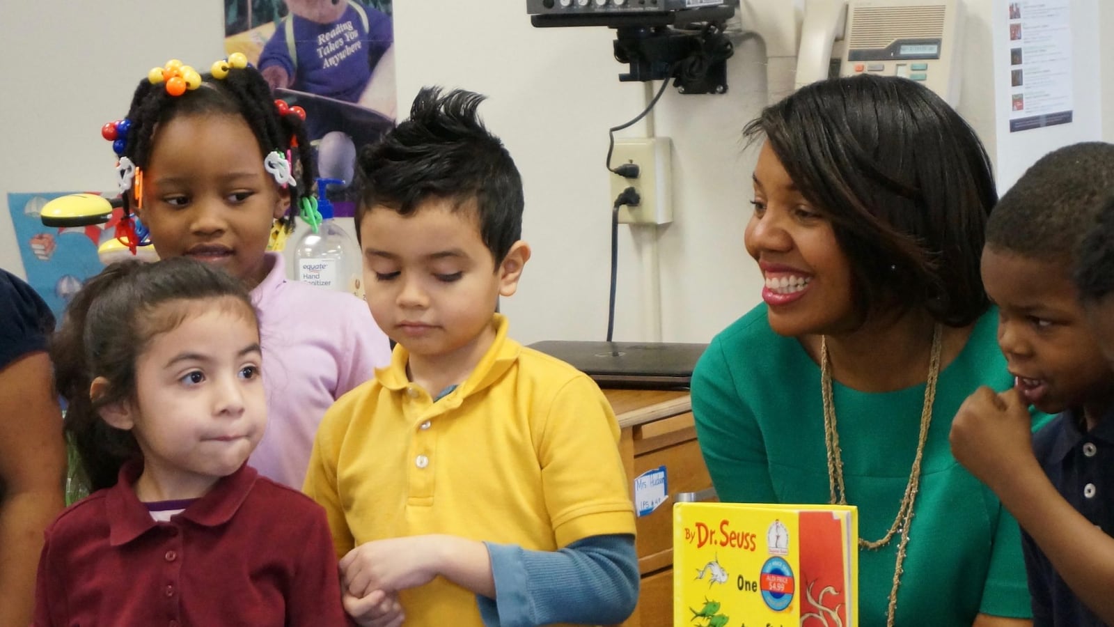 Aleesia Johnson reading to students at School 48
