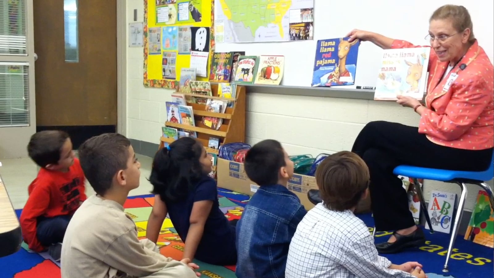 A retired teacher, Barbara Gottschalk, reads aloud.