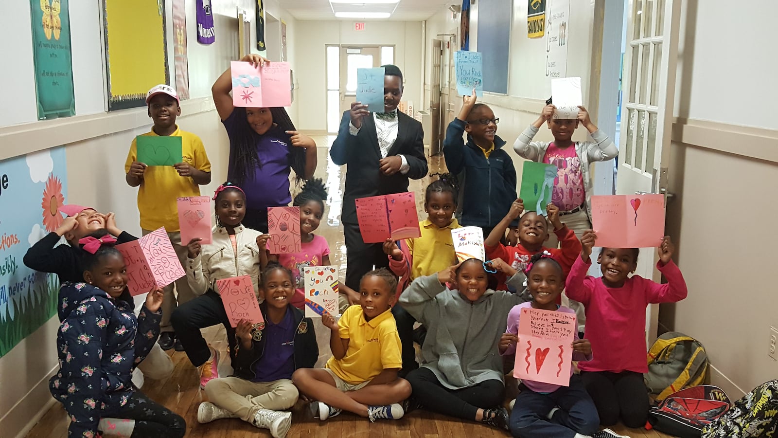 Memphis students show off "cancer awareness" posters they created as part of a Boys & Girls Club program at Promise Academy, a charter school in Raleigh. Three more clubs could open in Memphis schools by 2018.