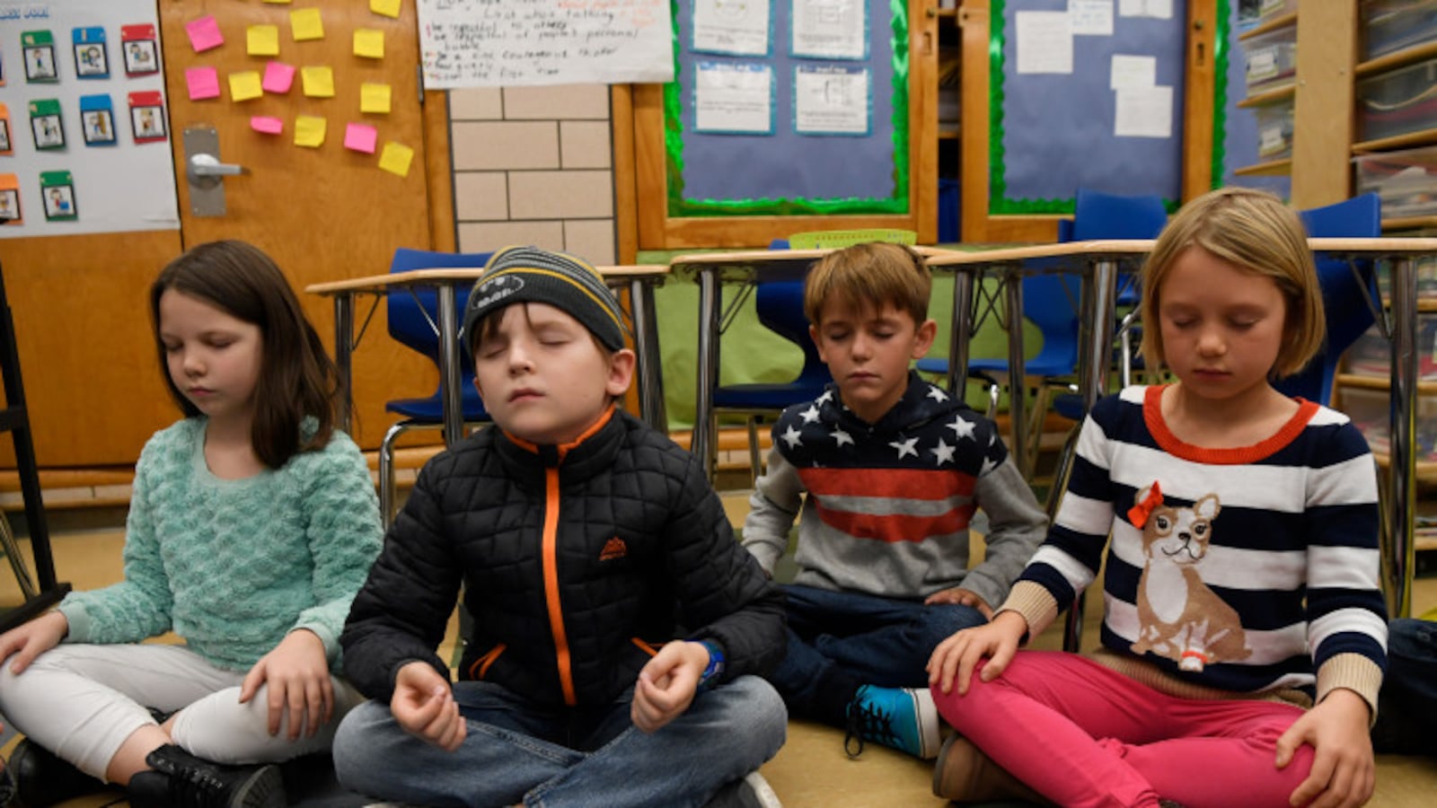 Creativity Challenge Community second graders close their eyes and collect their thoughts during a 15-minute mindfulness class in 2016.