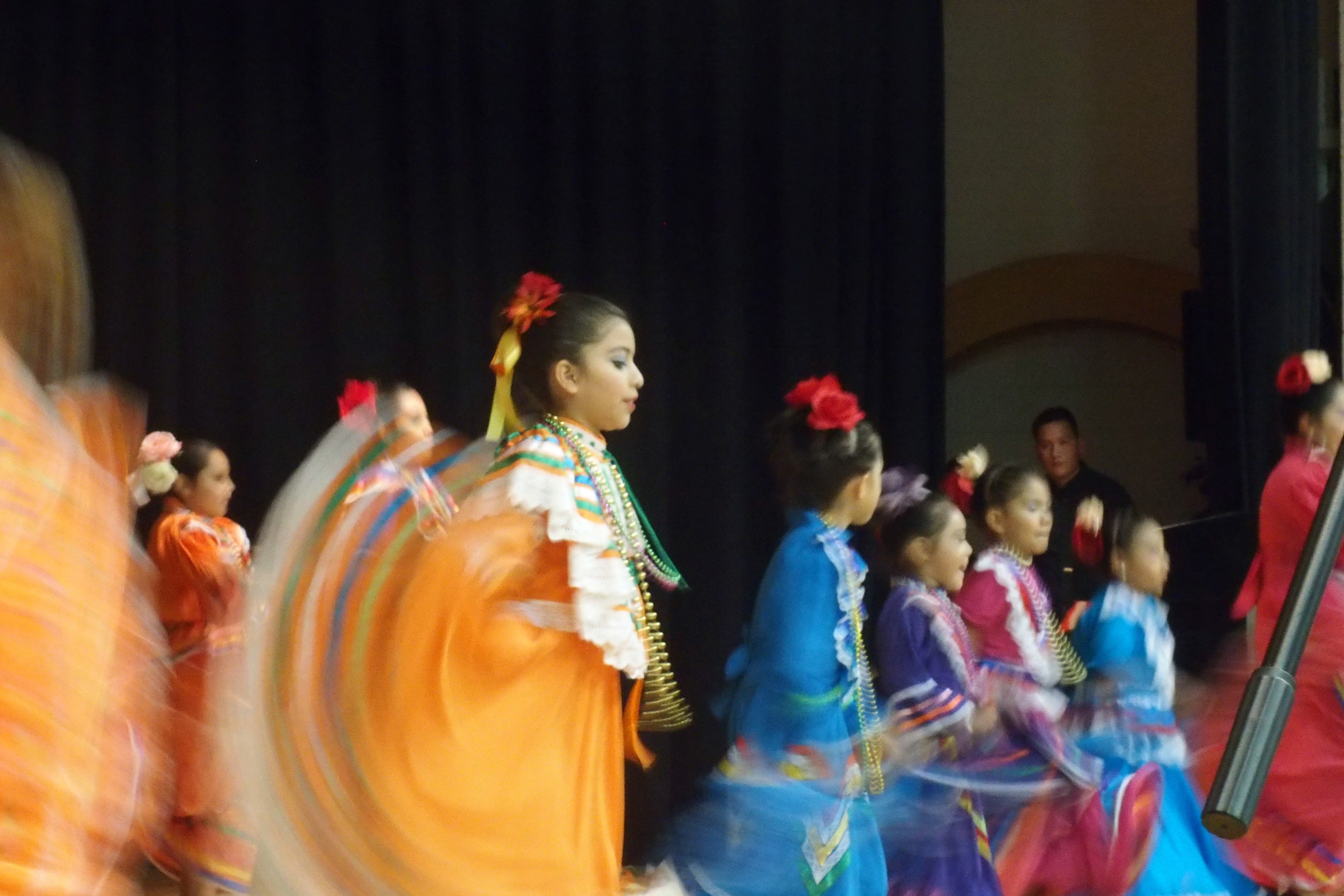 Students dance with their mothers at a Hispanic Heritage Month celebration in October.
