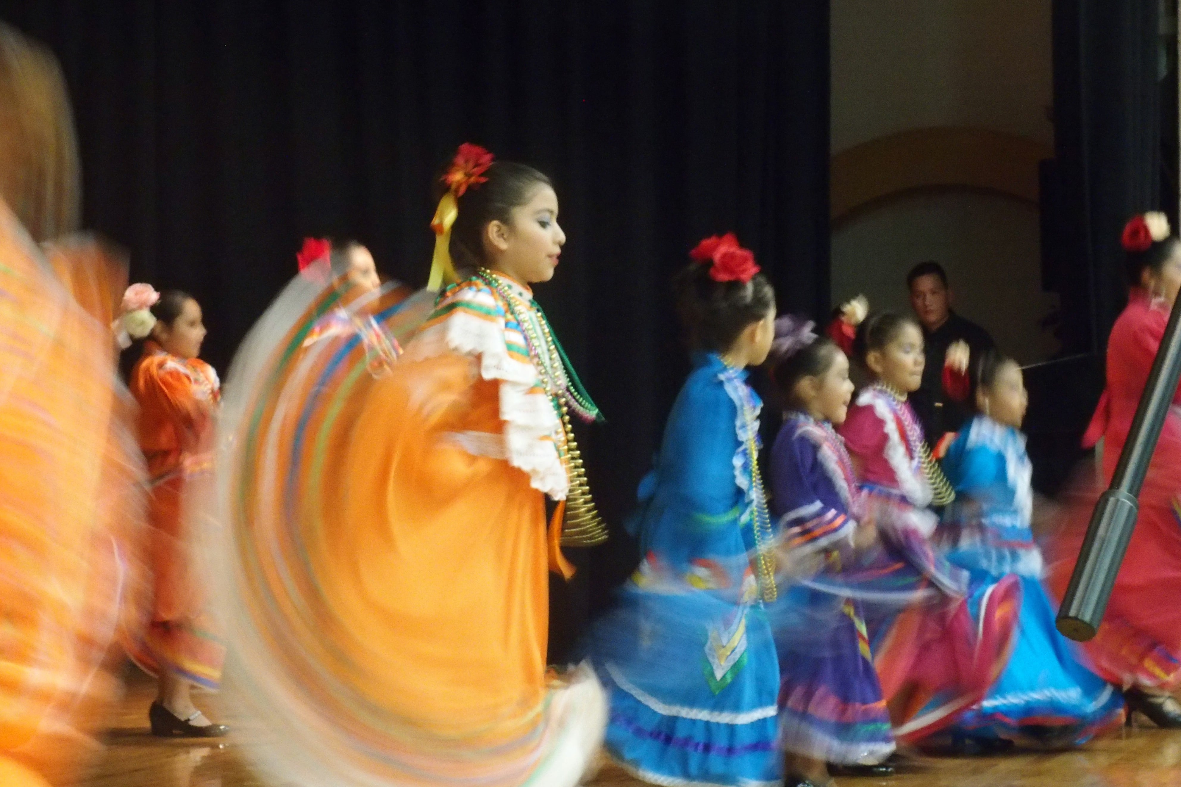 Students dance with their mothers at a Hispanic Heritage Month celebration in October.