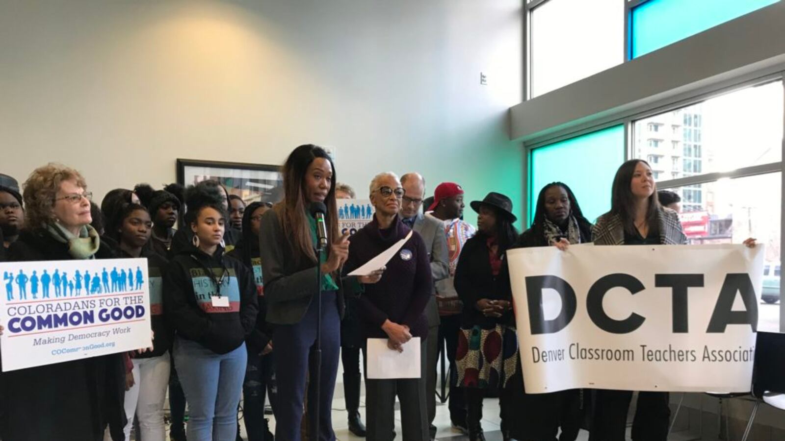 Teacher Monica Hunter, a member of the Denver Classroom Teachers Association black educators caucus, speaks at a press conference.