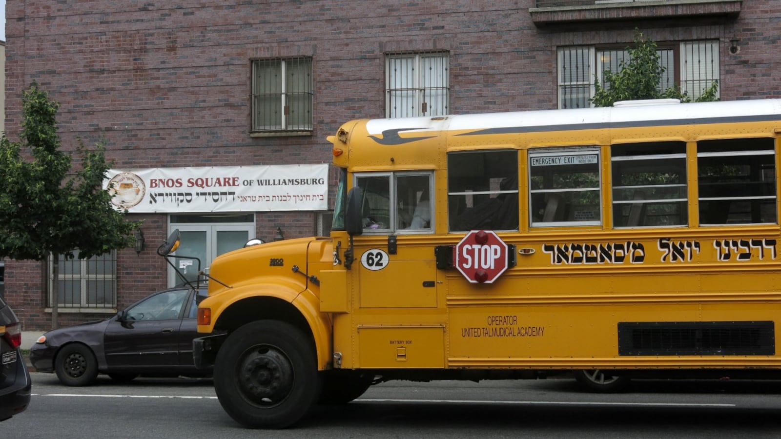 A school bus sits outside an all girls Jewish school in Williamsburg.