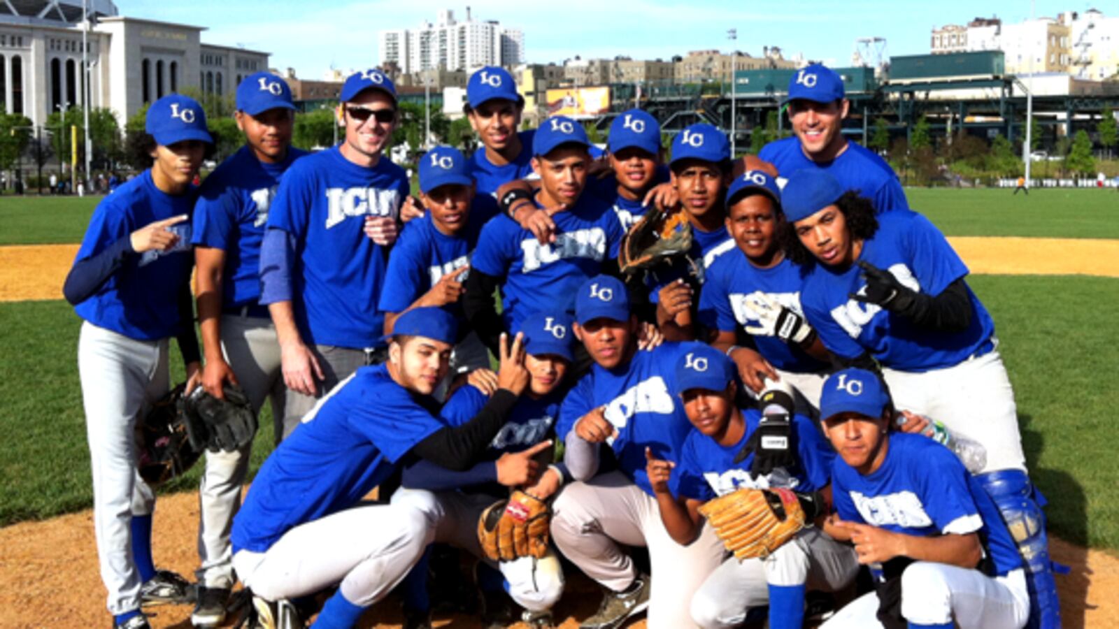 David Garcia-Rosen, pictured top left, poses with his International Community High School Baseball Team that he coaches through the Small Schools Athletic League.