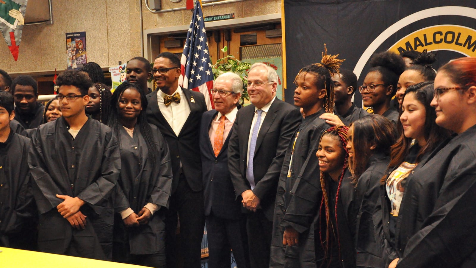 Malcolm X Shabazz High School students stand alongside Principal Naseed Gifted, center left, NJIT President Joel Bloom, and Stryker executive Robert Cohen at the academy's unveiling on Dec. 4, 2019.