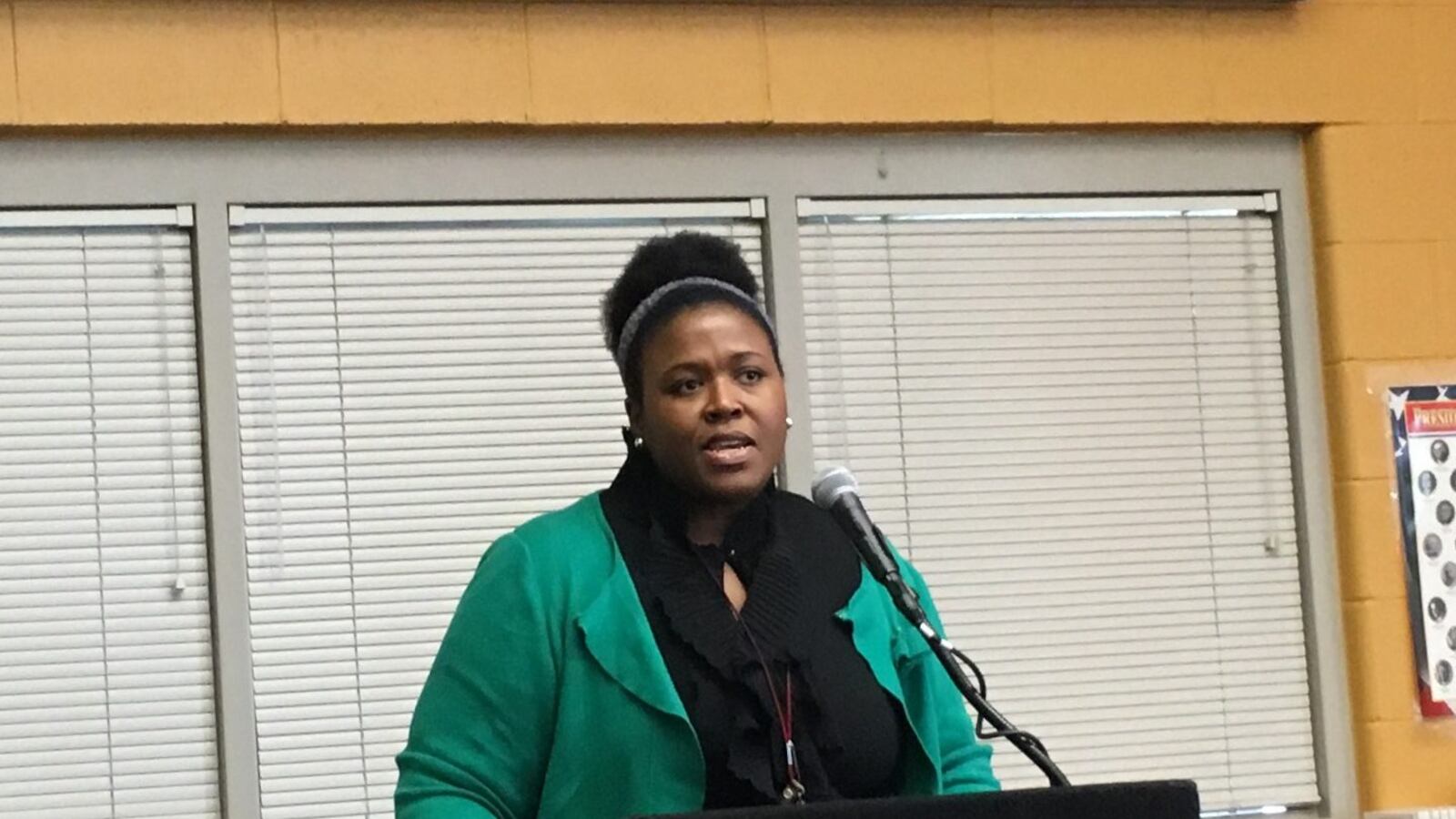 AuStina Nelson, a 13-year art teacher in Detroit's main district, will receive a raise as part of an amended teacher contract.