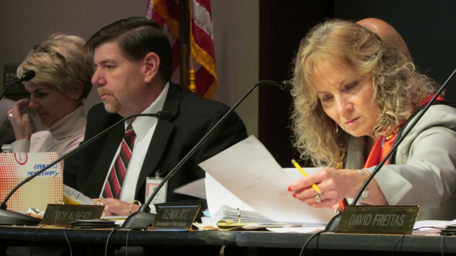 Indiana State Board of Education members Cari Whicker and Brad Oliver with state Superintendent Glenda Ritz, pictured at December's meeting.
