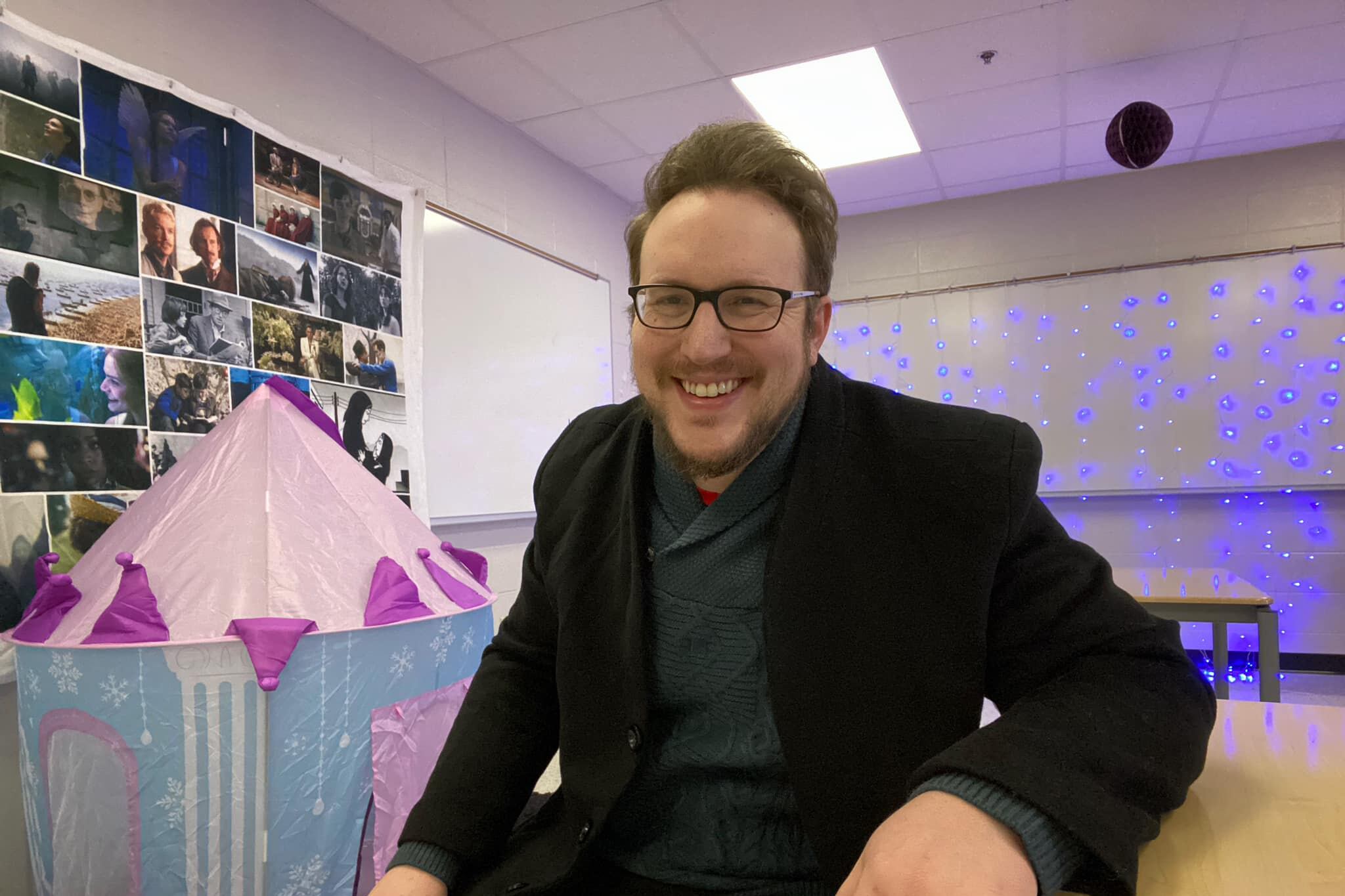 man sits in classroom