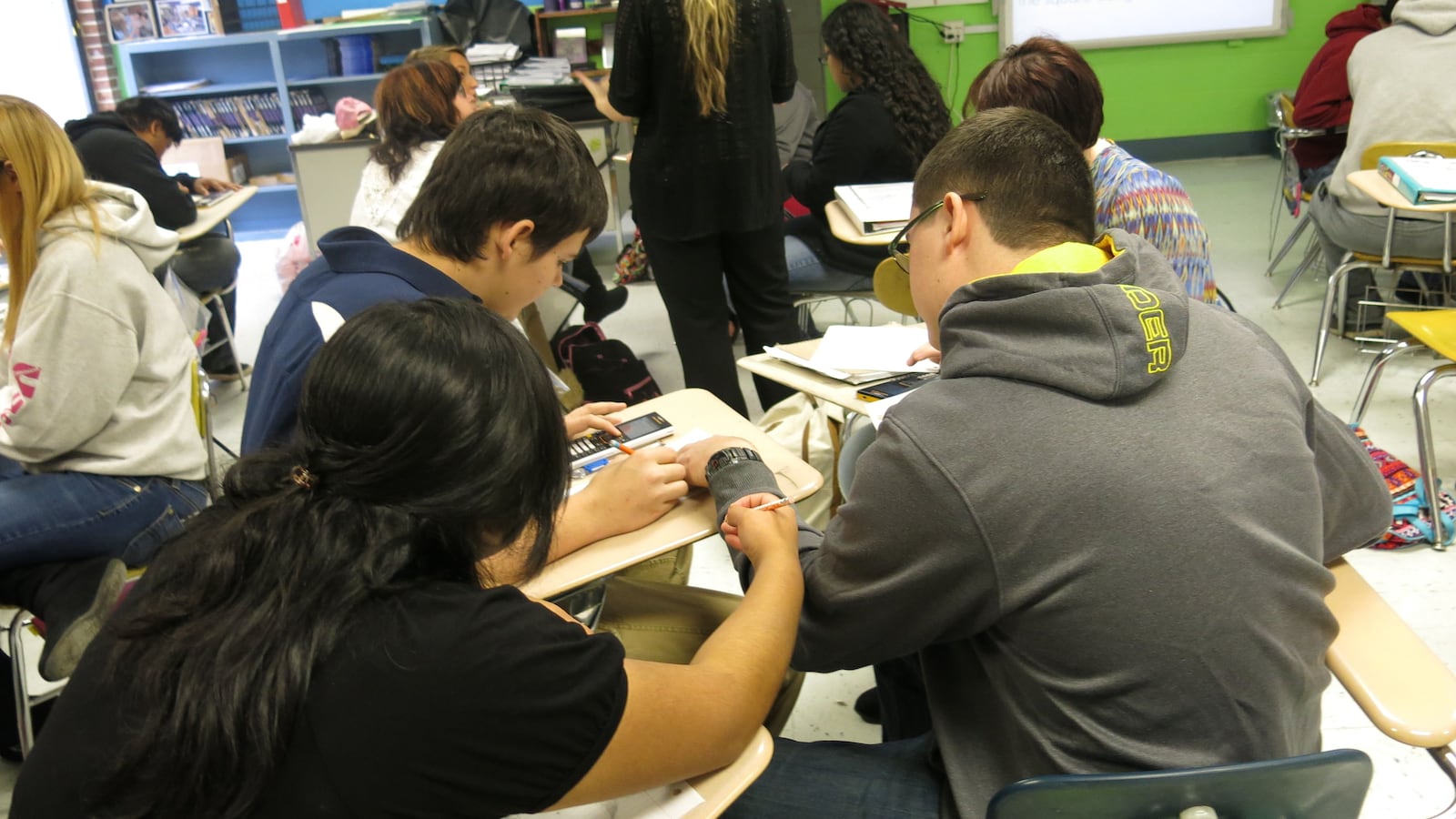 Students in Christin Root's Integrated Math I class at Monterey High School work in groups on a  word problem. The Putnam County school was one of the first in the state to switch to an integrated math approach.