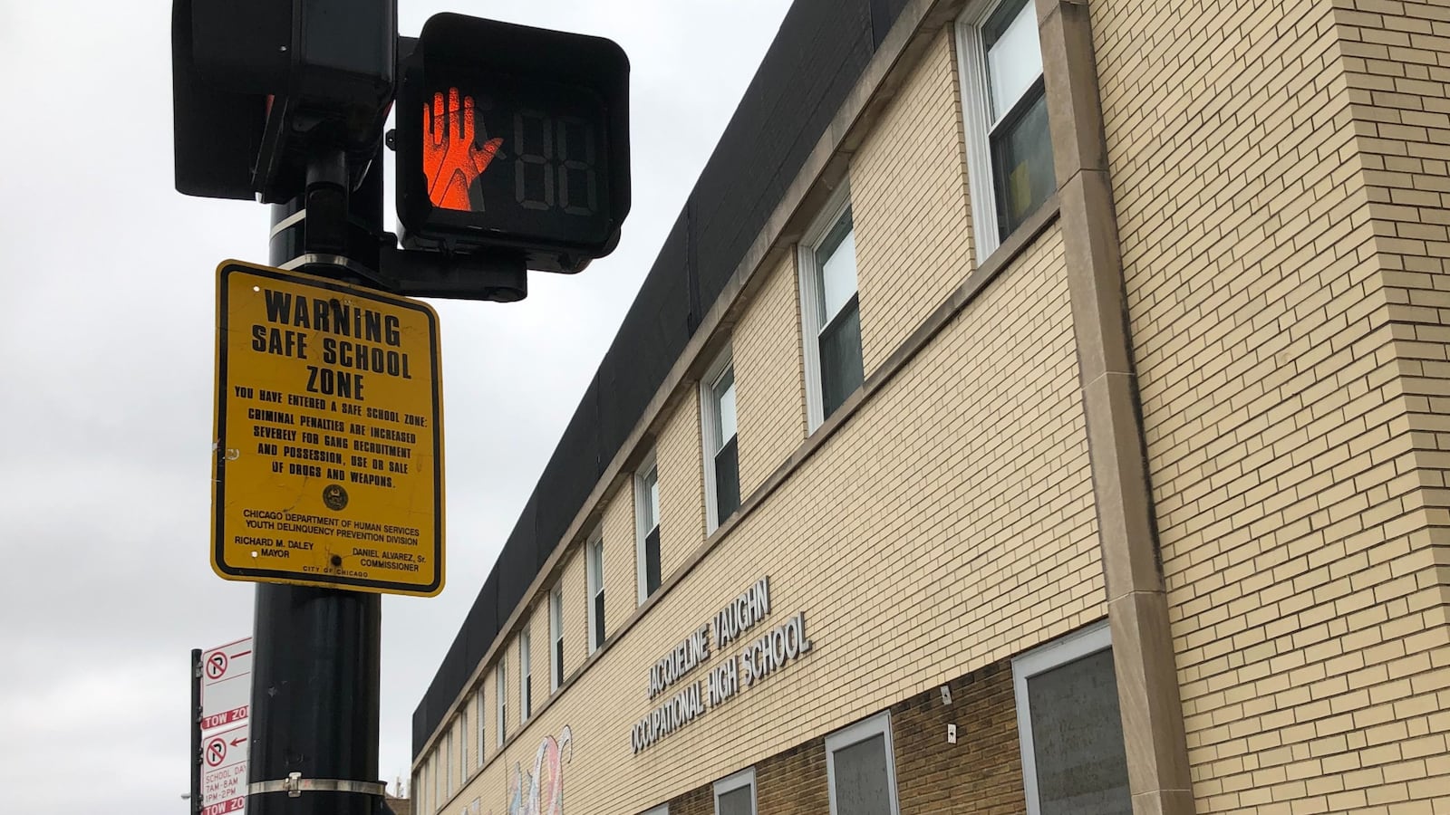 Chicago closed Vaughn Occupational School after a special education aide there tested positive for coronavirus.