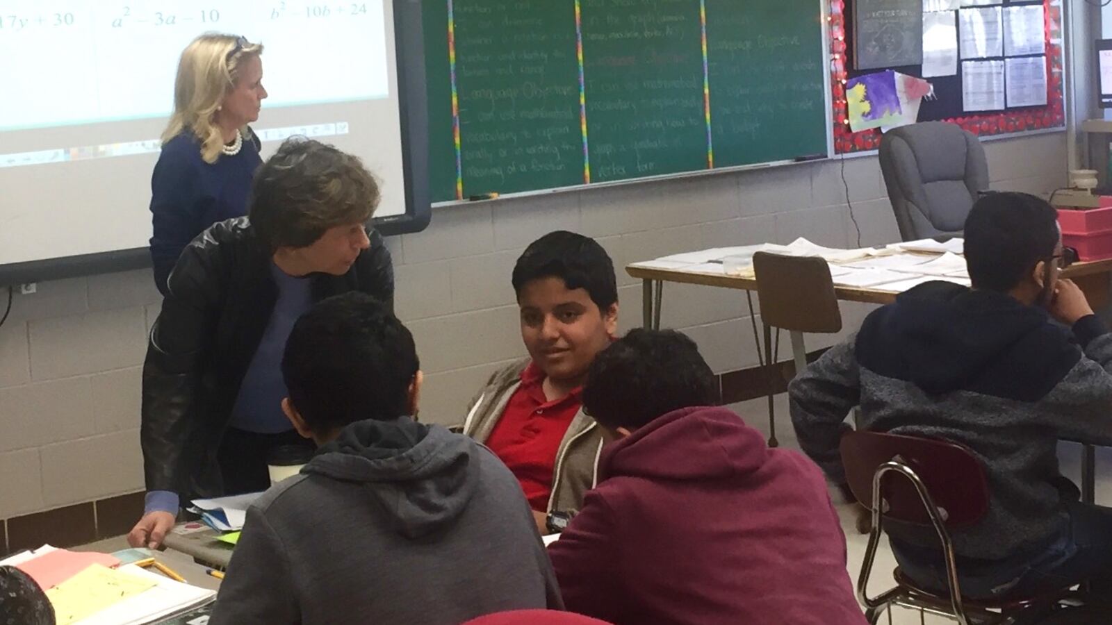 American Federation of Teachers President Randi Weingarten talks to students in a math class for English language learners at Edsel Ford High School in Dearborn, Michigan.