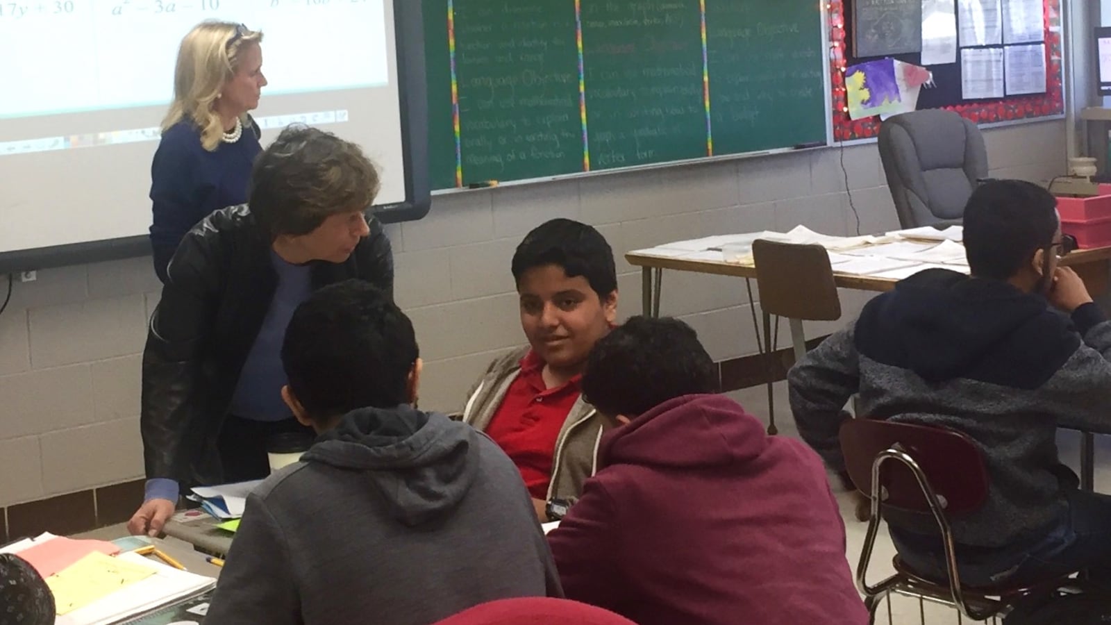 American Federation of Teachers President Randi Weingarten talks to students in a math class for English language learners at Edsel Ford High School in Dearborn, Michigan.