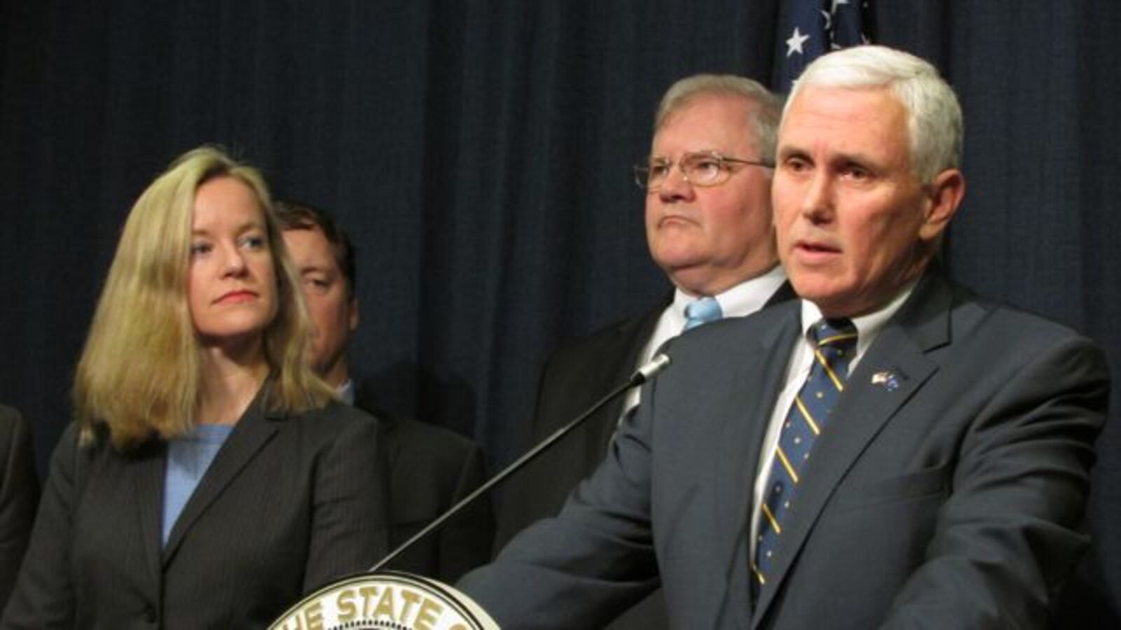Gov. Mike Pence speaks to reporters about the preschool pilot program while his education adviser, Claire Fiddian-Green, looks on. (Scott Elliott)