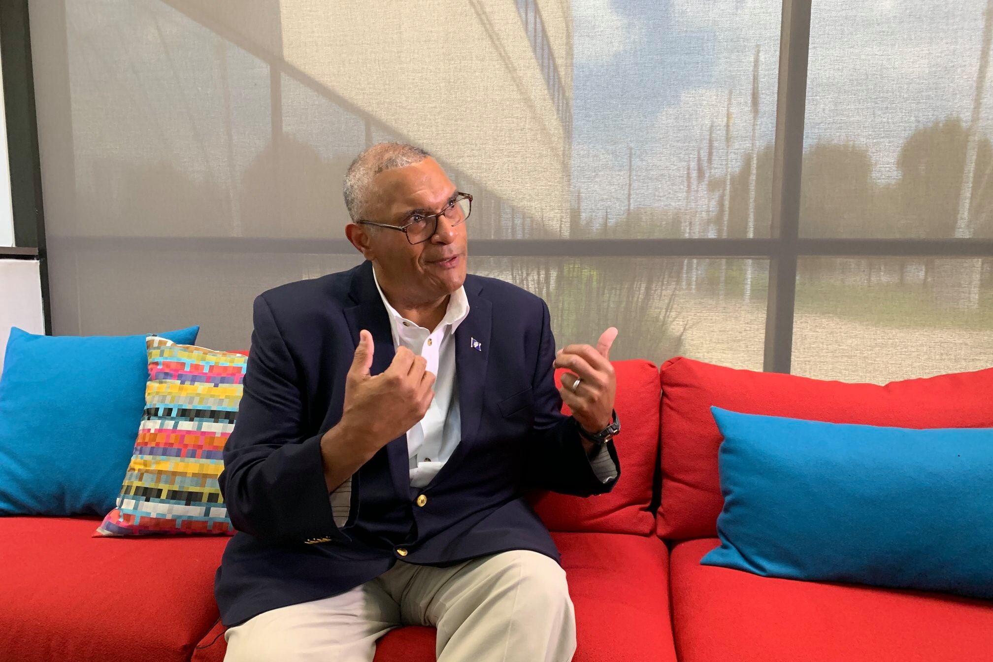Indiana Democratic gubernatorial candidate Woody Myers sits on a couch