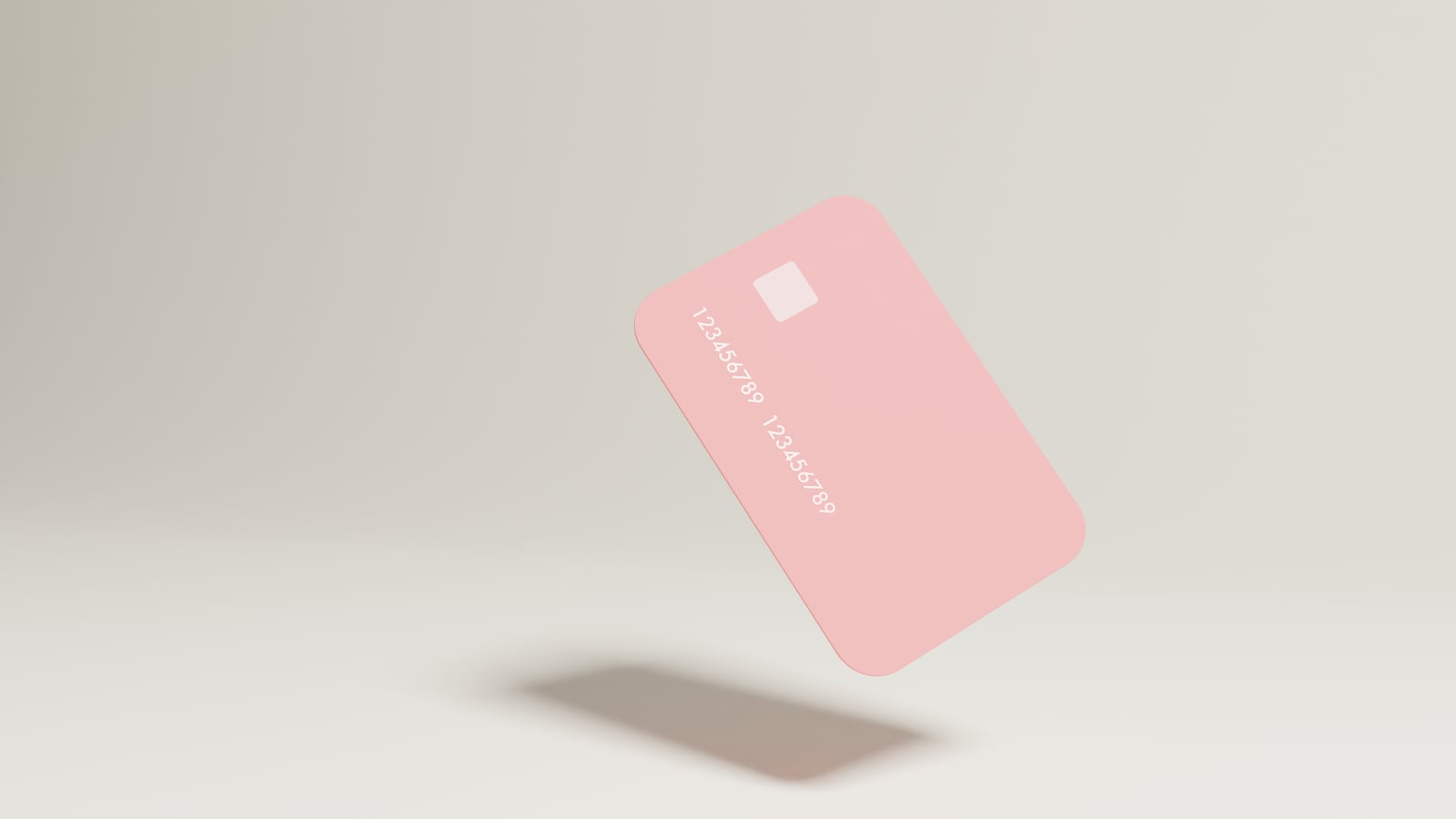 Abstract photo of a pink credit card floating in the air.