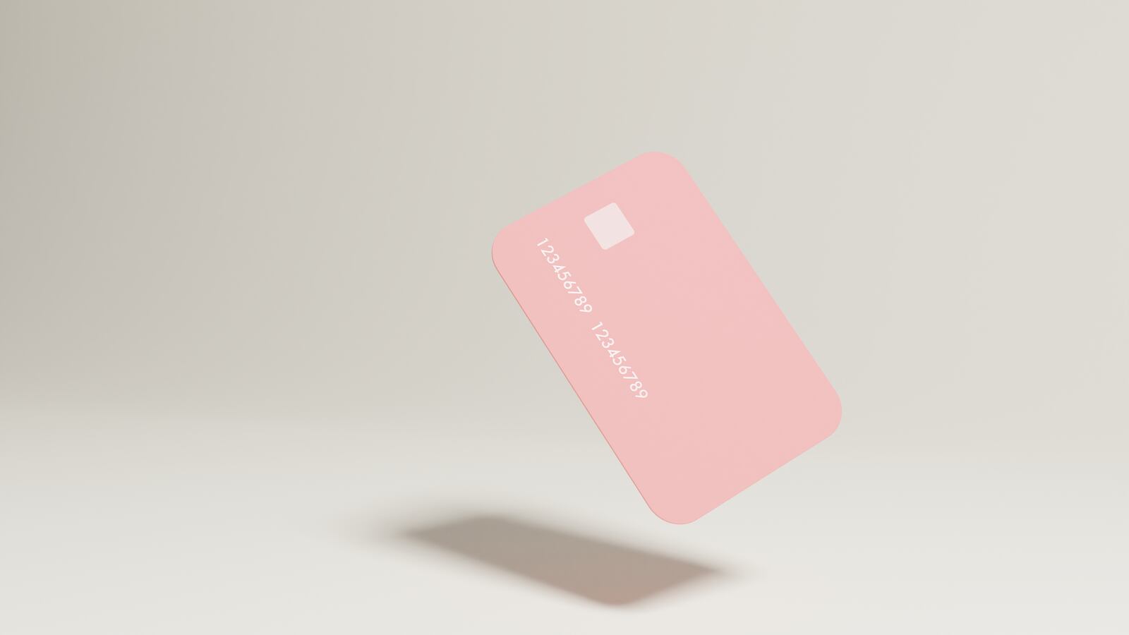 Abstract photo of a pink credit card floating in the air.