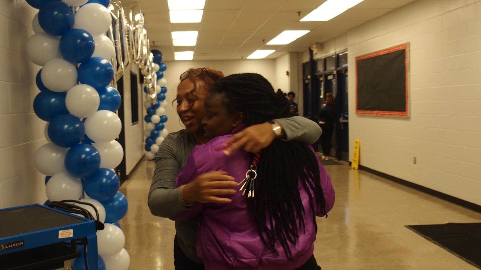 Kirby High School students and staff reunited before a scheduled return to the Memphis building Monday. The school had been closed because of rats and about 800 students were scattered to three locations as Shelby County Schools worked on the building.